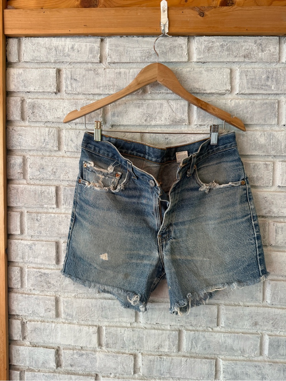 Levi's Faded Blue Distressed Denim Shorts